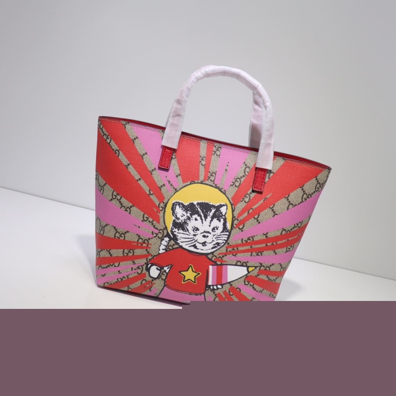 G*u*i shopping bags